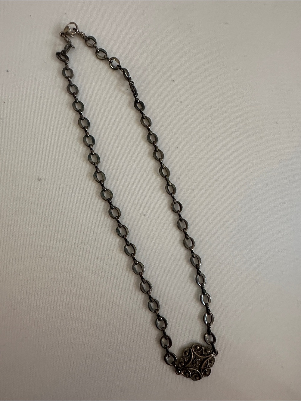 Delicate Dark Metal Chain Necklace with Ornate Pendant